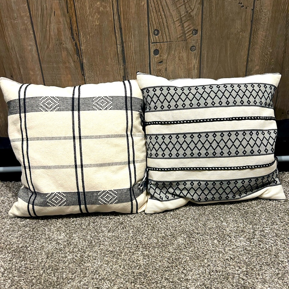 Black and white bohemian decor pillows.